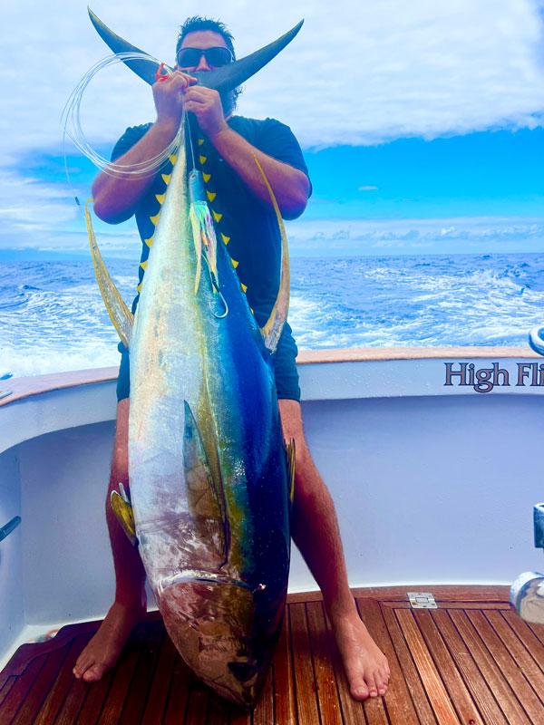 Huge Yellow Fin Tuna caught by angler on High Flier Sportfishing boat in Kona, Hawaii